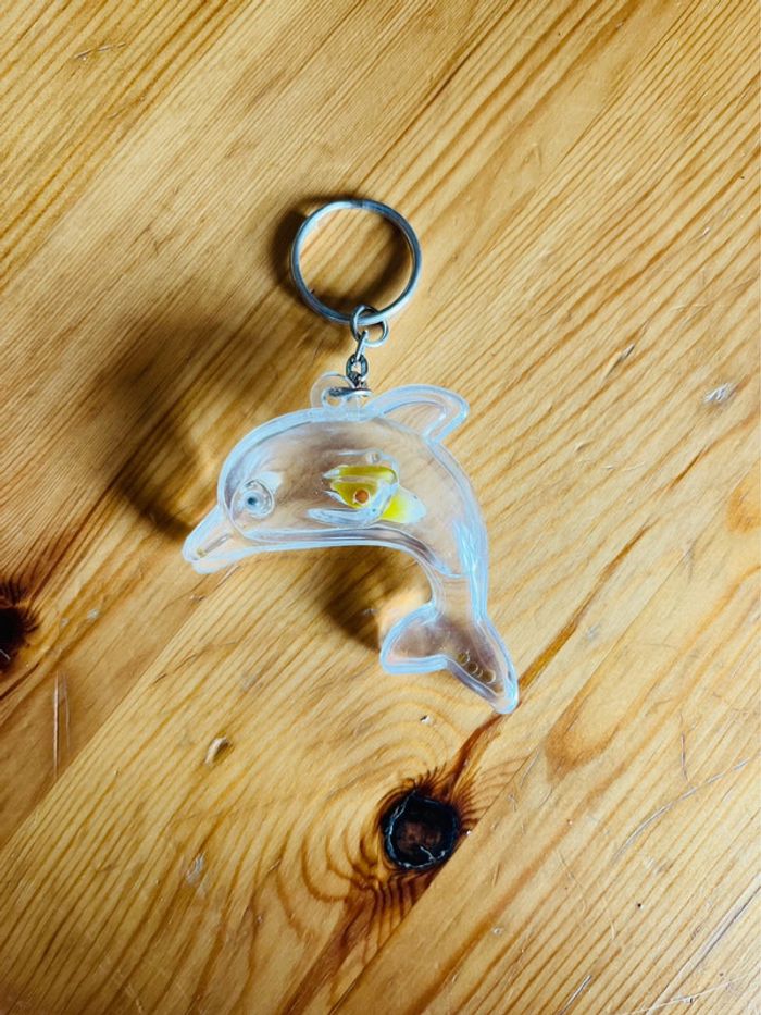 Porte clés dauphin transparent