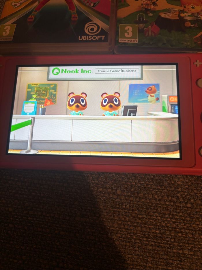 Nintendo switch lite corail - photo numéro 9