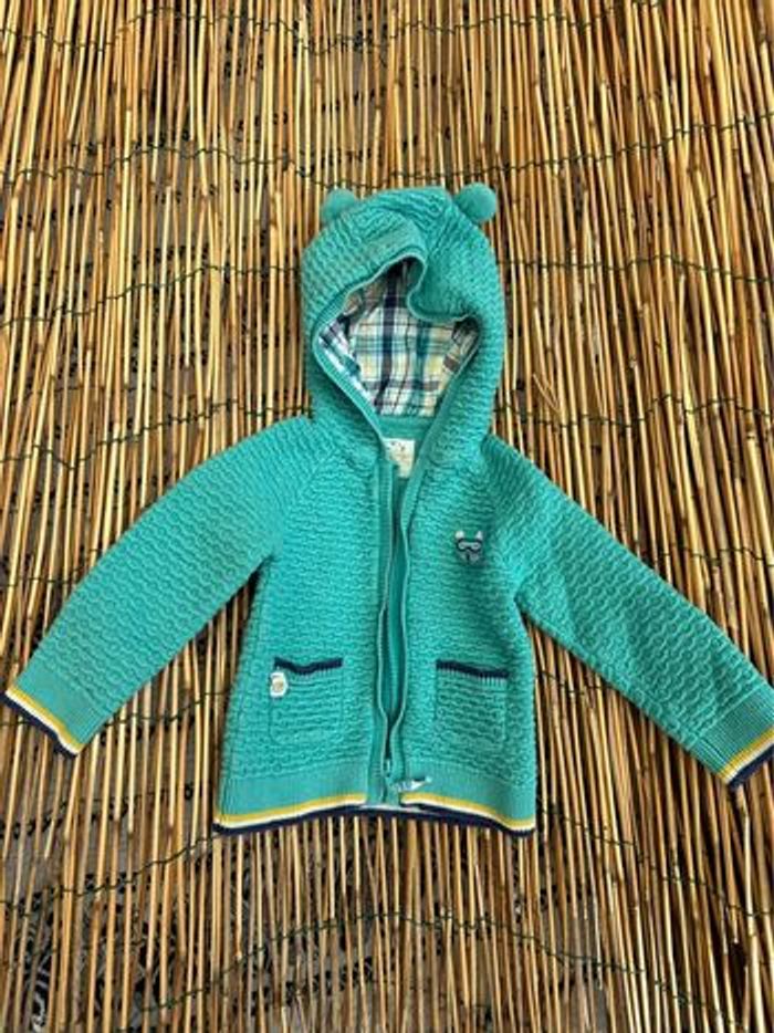 Gilet zippé à capuche