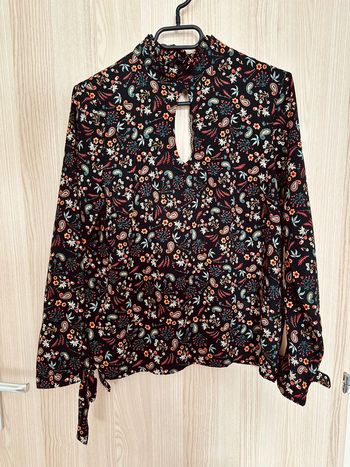 Blouse fleurie manches longues dos ouvert noir multicolore taille 38 Morgan