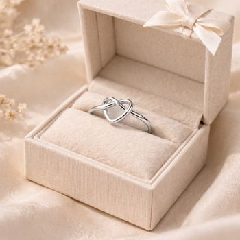 Bague argentée noeud coeur réglable en acier inoxydable