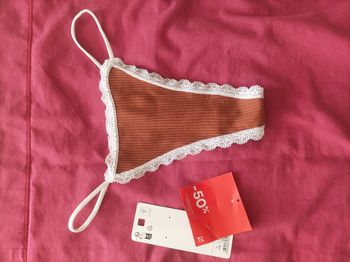 String marron neuf taille M