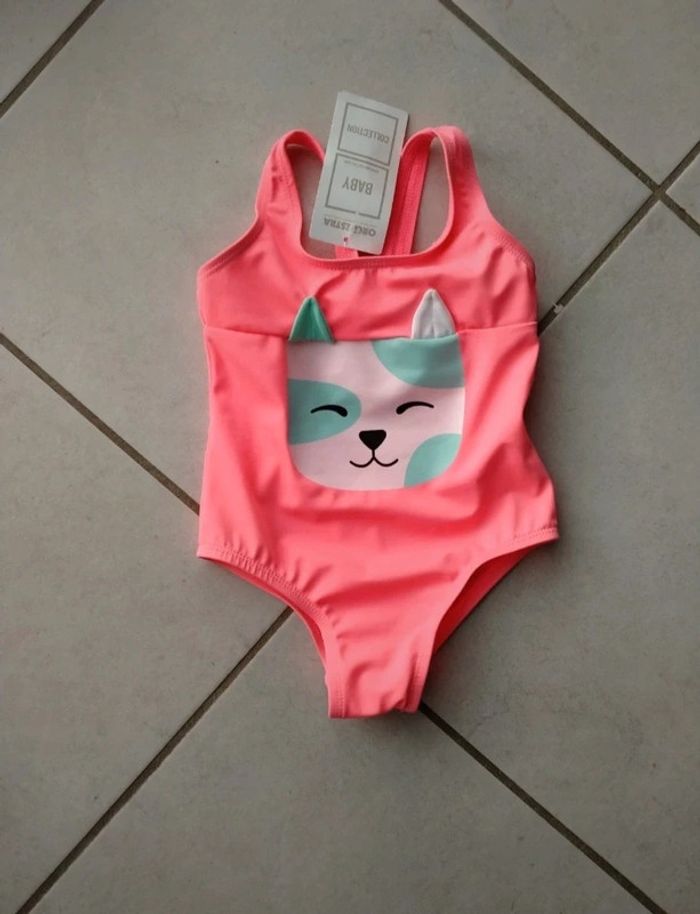 Maillot de bain. Bébé fille . 1 pièce. Orchestra. neuf.
Taille 12 mois