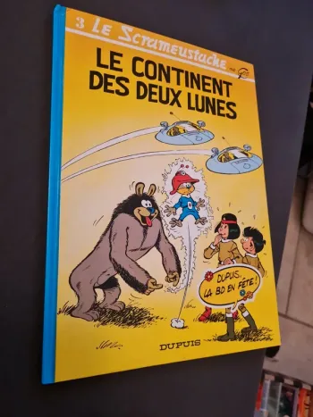 Le Scrameustache - le continent des deux lunes