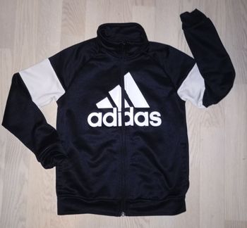 Veste de jogging en nylon noir Adidas 
T. 9-10 ans