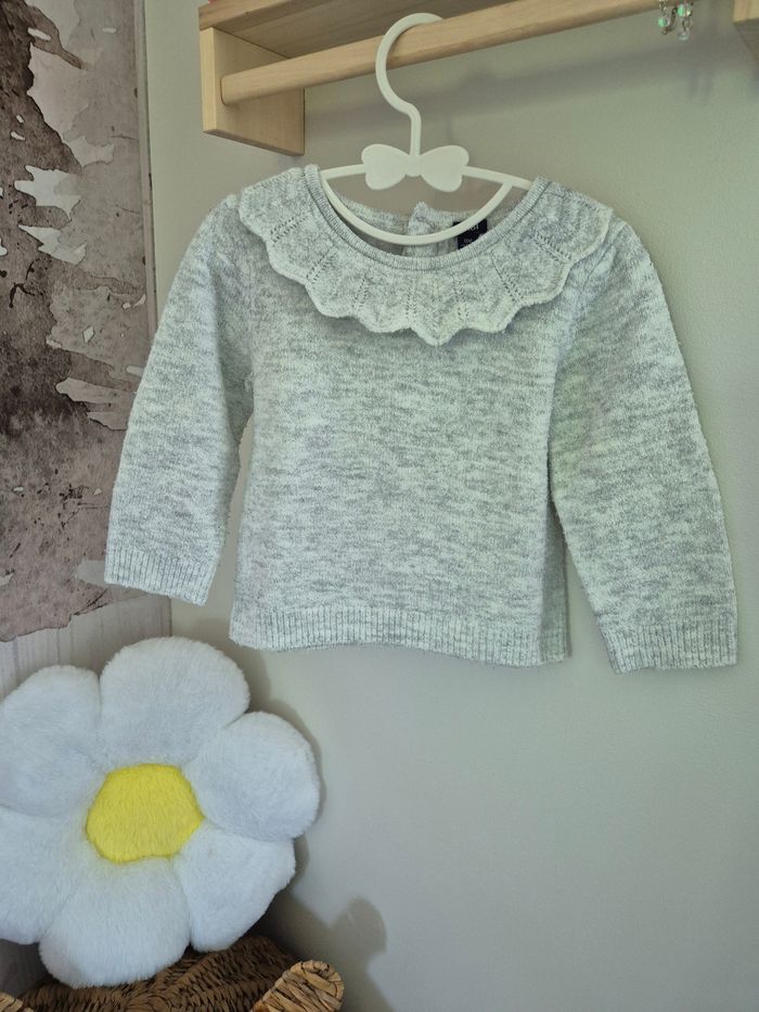 Pull à collerette