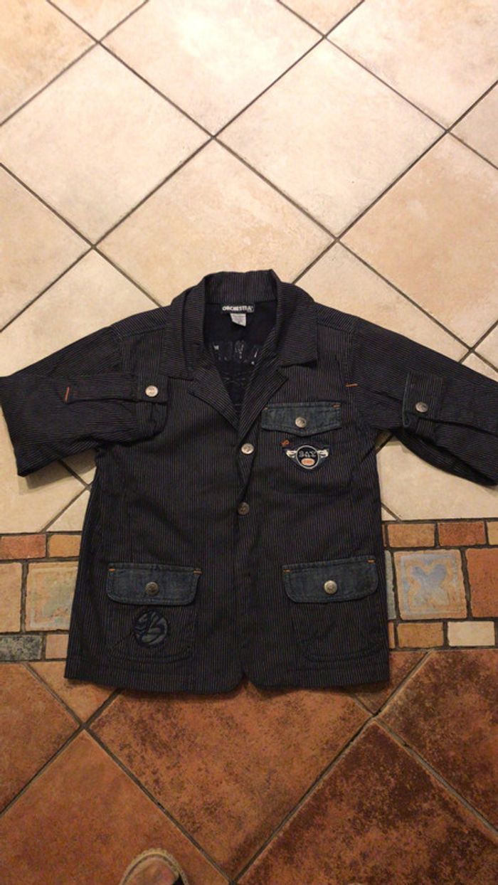 Orchestra veste rayé