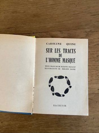 Livre « sur les traces de l’homme masqué » Caroline Quine