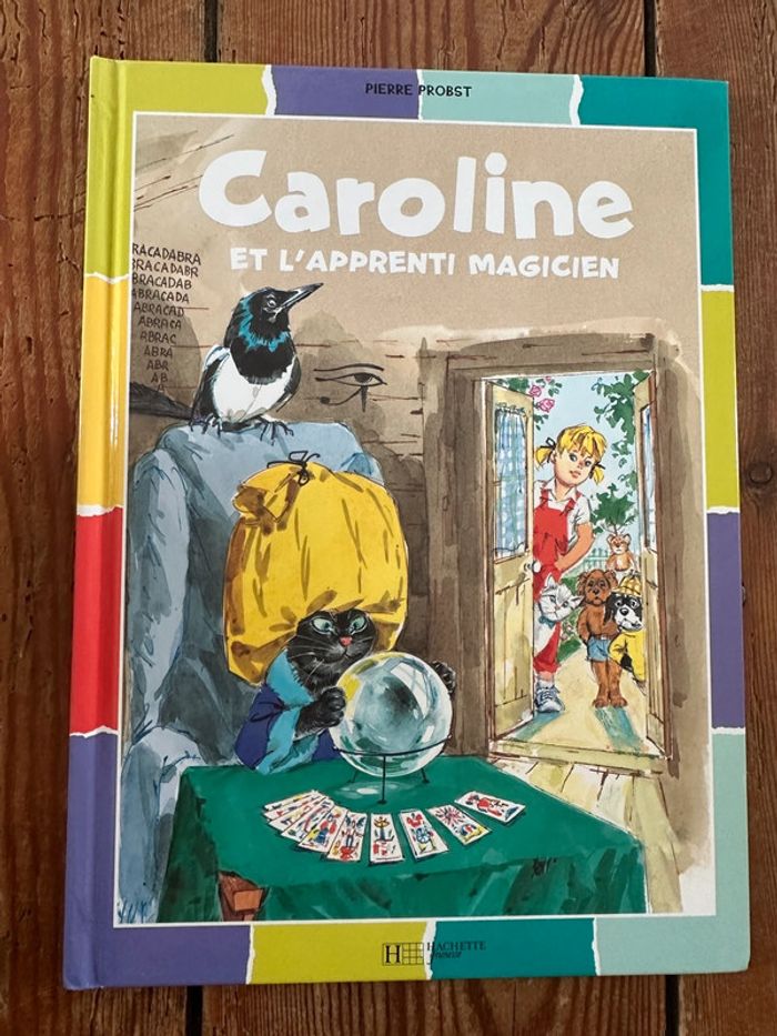 Livre rare Caroline et l’apprenti magicien album damiers couleurs collection Pierre Probst