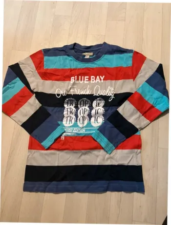 T-shirt orchestra 12 ans à rayures très bon état