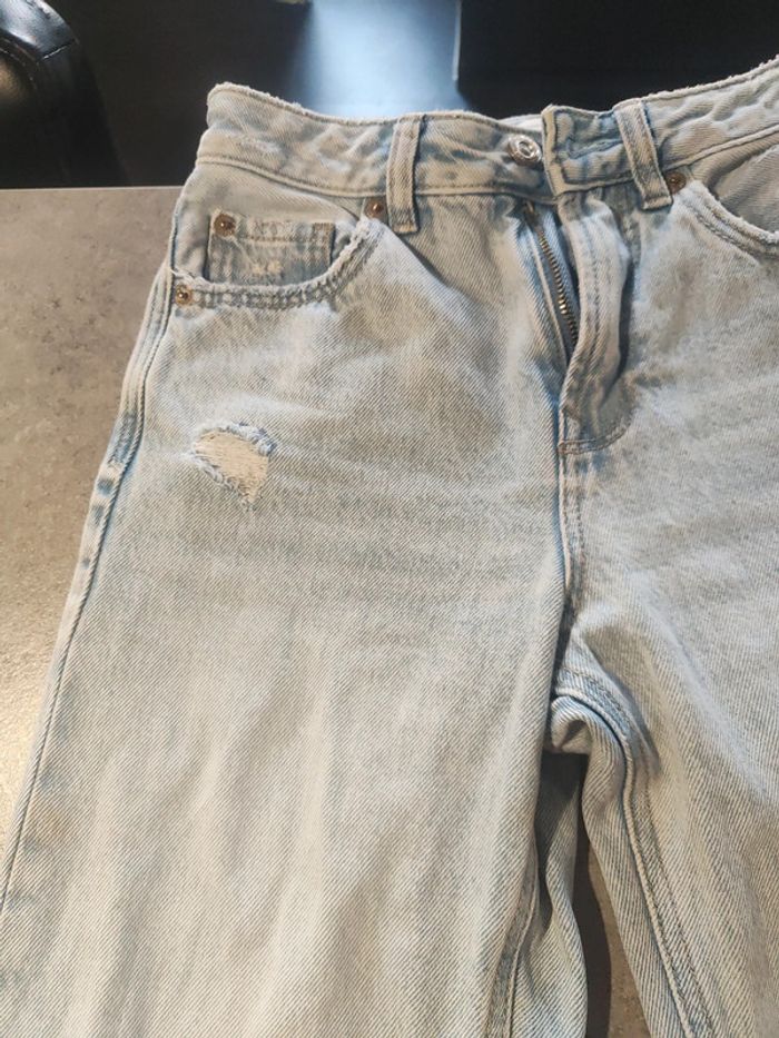 Jean à trous Stradivarius pattes d'éléphant bleu clair taille 32 - photo numéro 2