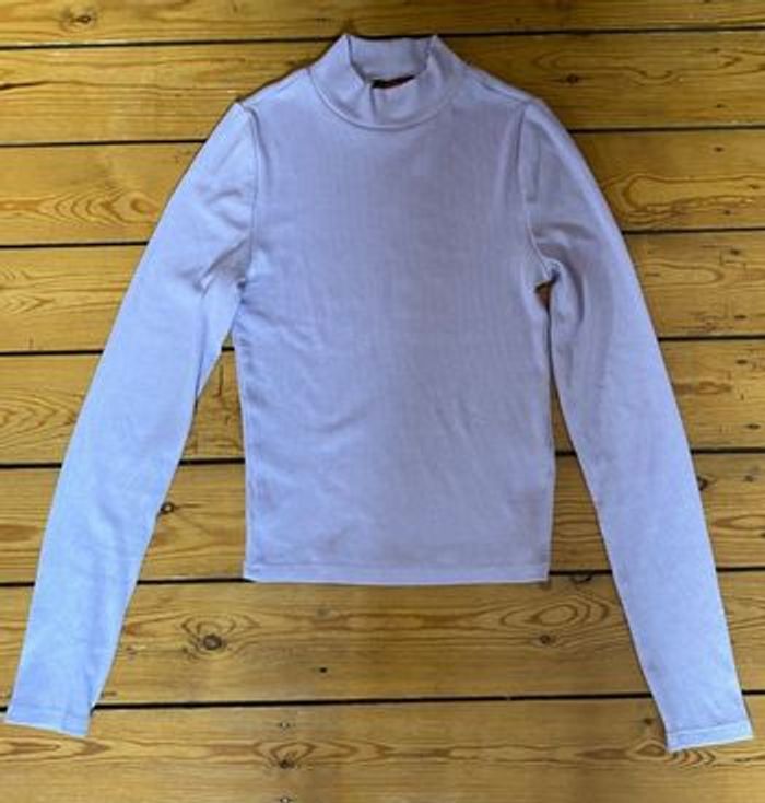 Pull col roulé