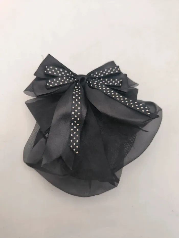 Pince à cheveux avec barrette et noeud pour chignon élégant
