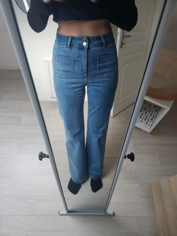 Jean Oraije bleu taille 38, évasé et taille haute.