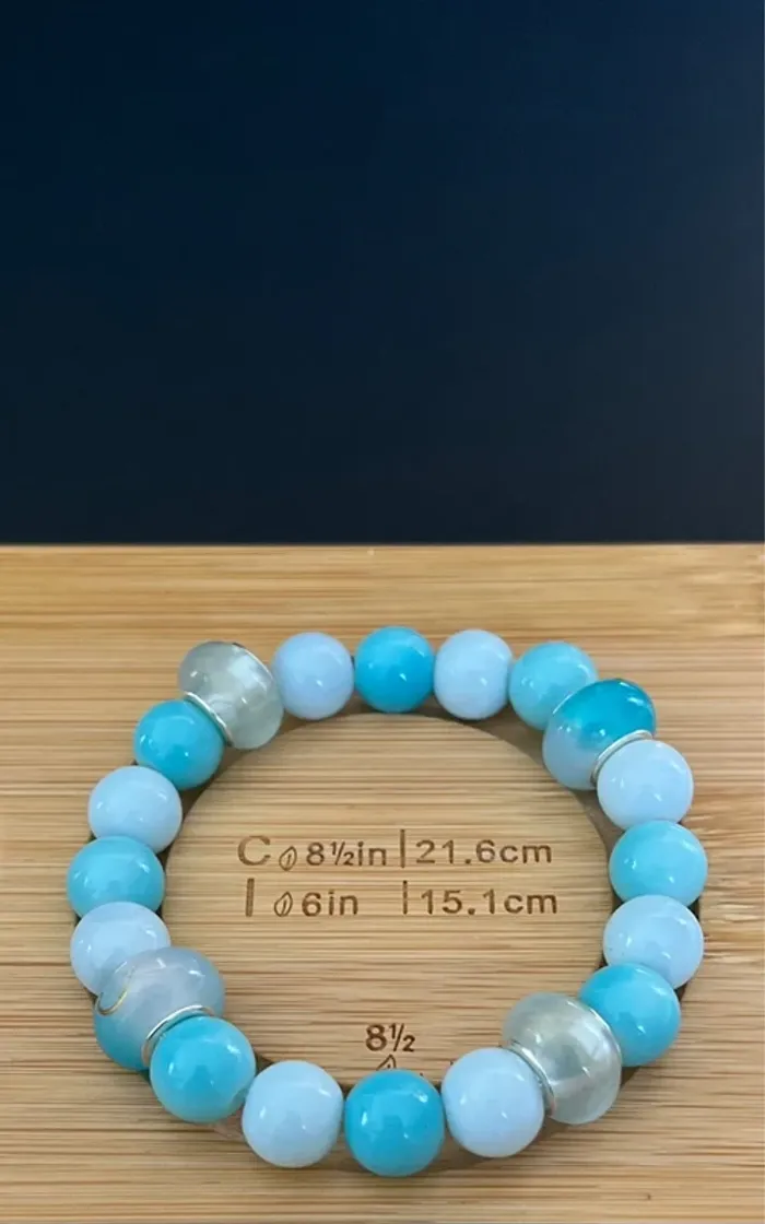 Bracelet bleu avec charme - photo numéro 4