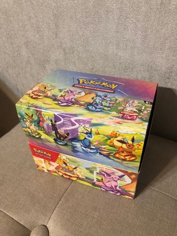 Display mini tin Pokémon évolutions prismatiques ev8.5