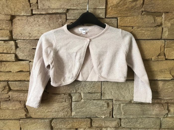 Très joli boléro doré brillant 18 mois