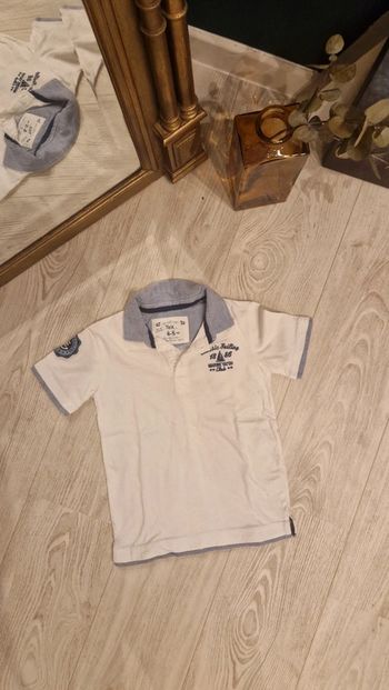 Polo chic blanx et bleu Tex 🐯 4 / 5 ans