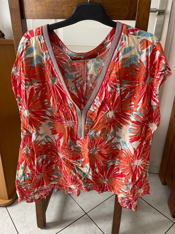 Blouse courte sans manches