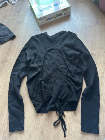 Pull dos dénuder
