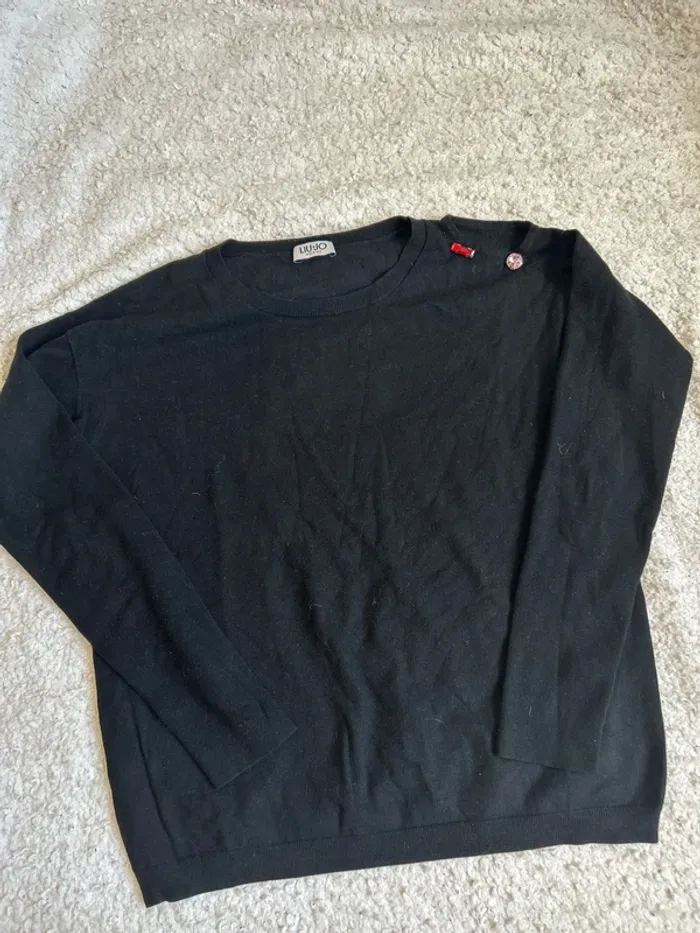 Pull épaule dénudée
