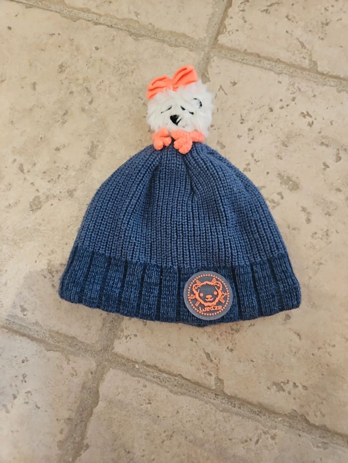 Bonnet avec petit yeti en pompom