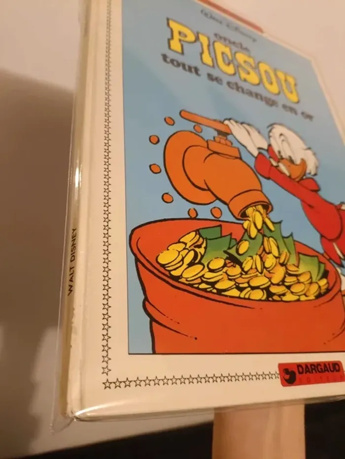 Oncle Picsou - Tout se change en or - Dargaud - photo numéro 2