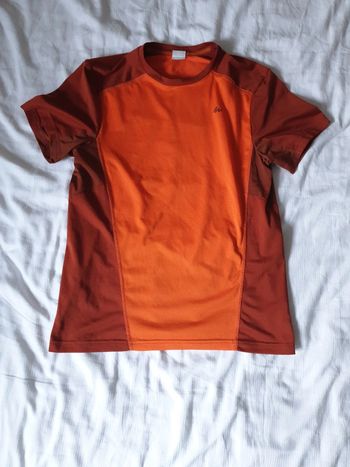 Haut sport homme marque Quechua taille S