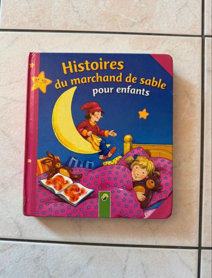 Livre histoire de marchand de sable