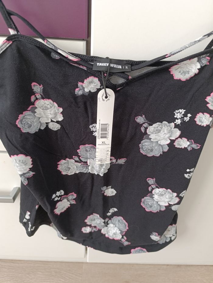 Top neuf - photo numéro 2