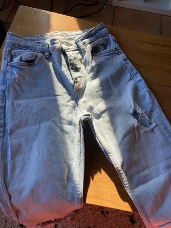 Pantalon trouée taille haute