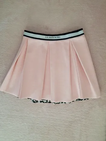 Jupe plissée IKKS 8 ans réversible rose clair ou tachetée noir et blanc