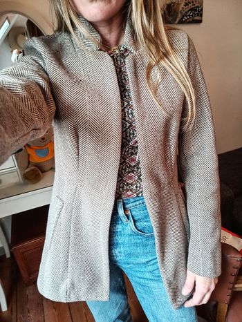 Veste Attention défaut au dos