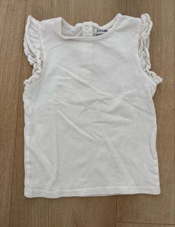 T-shirt blanc sans manches 