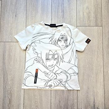 Maillot blanc et noir. Garçon 12 ans. Marque Naruto
