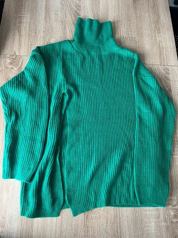 Pull avec fente sur le côté taille 38