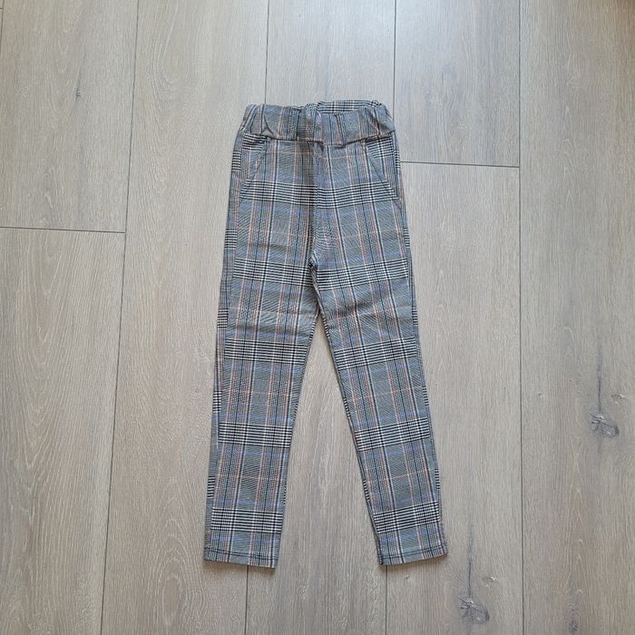 Très beau pantalon, taille élastique, noir, blanc camel bleu. Fille 6 ans