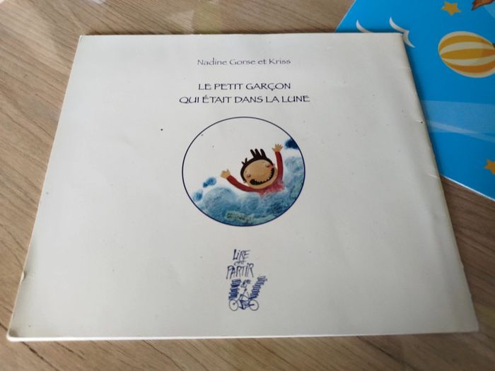 Livre le petit garçon qui était dans la lune - photo numéro 2
