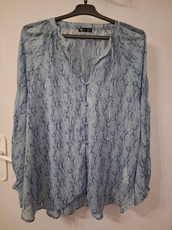 Chemise taille 3 xl en très bon état 