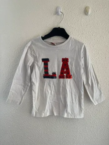 Pull à sequins taille 4 ans 💫