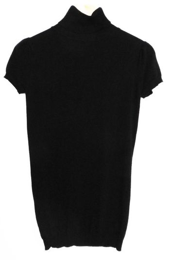 Pull noir a col roule. Manches courtes. Naf Naf. Taille 36