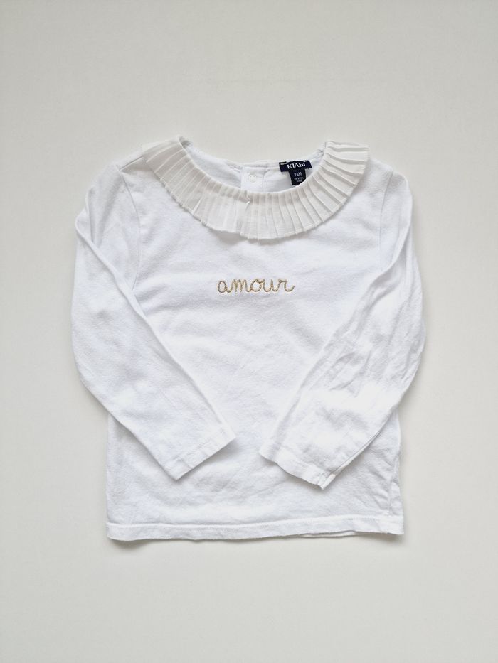 Kiabi - Tee-shirt manches longues - Col volanté - Amour (2 ans)