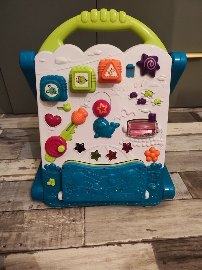 Trotteur multi activités 