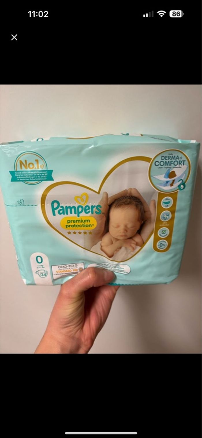 4 paquets de couches taille 0