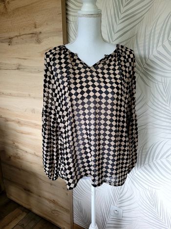 Blouse femme taille M légèrement transparente