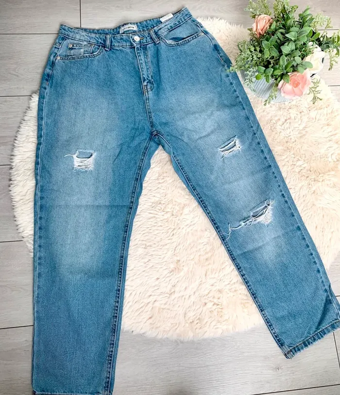 Jean mom troué bleu