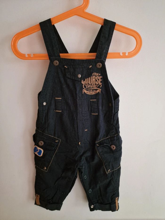 Salopette bleue Marine
Bébé garçon 6 mois
Sucre d'orge