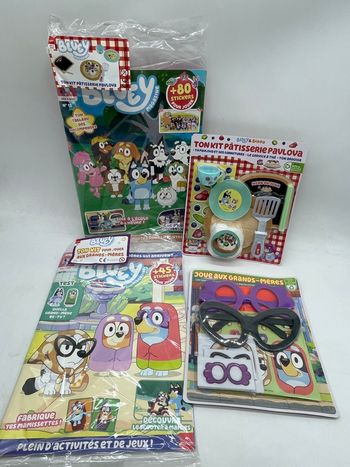 Lot de 2 livres d'activité magazine Bluey Neuf avec ces jouets   Le lot est neuf. Le lot n'est pas dissociable ! Numero 11 et 13