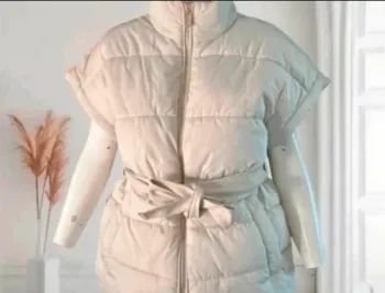 Doudoune sans manches beige femme ceinturée, tendance
