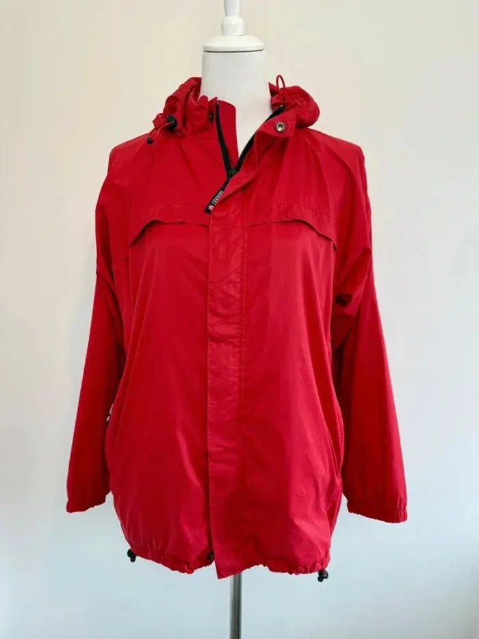 Veste de pluie Aigle femme S ou enfant 14 ans rouge en parfait état